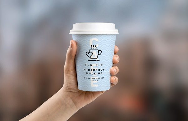 1462385913-3385-Coffee-Cup-In-Hand-MockUp